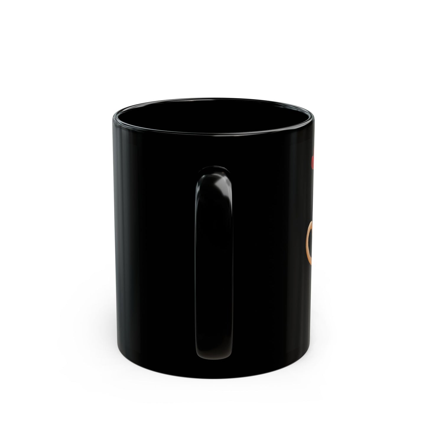 Side view of a black ceramic coffee mug showing the handle, with partial artwork visible on the right edge.