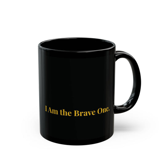 Black mug with gold text "I Am the Brave One," a motivational and inspiring mug for daily self-love and empowerment.