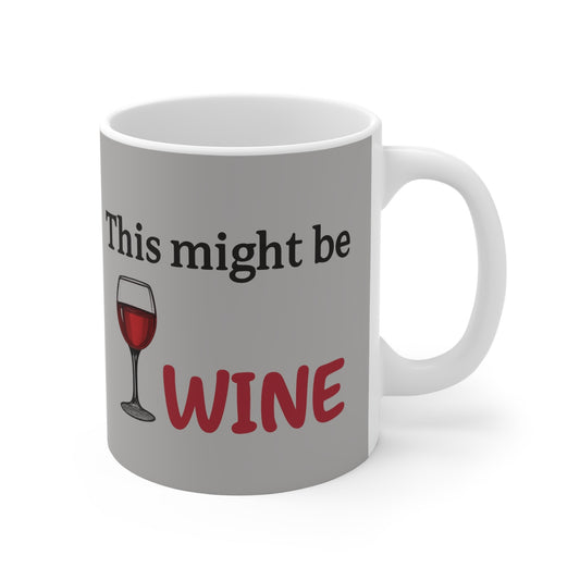 Light grey 11oz coffee mug with funny wine quote "This might be WINE" and red wine glass illustration