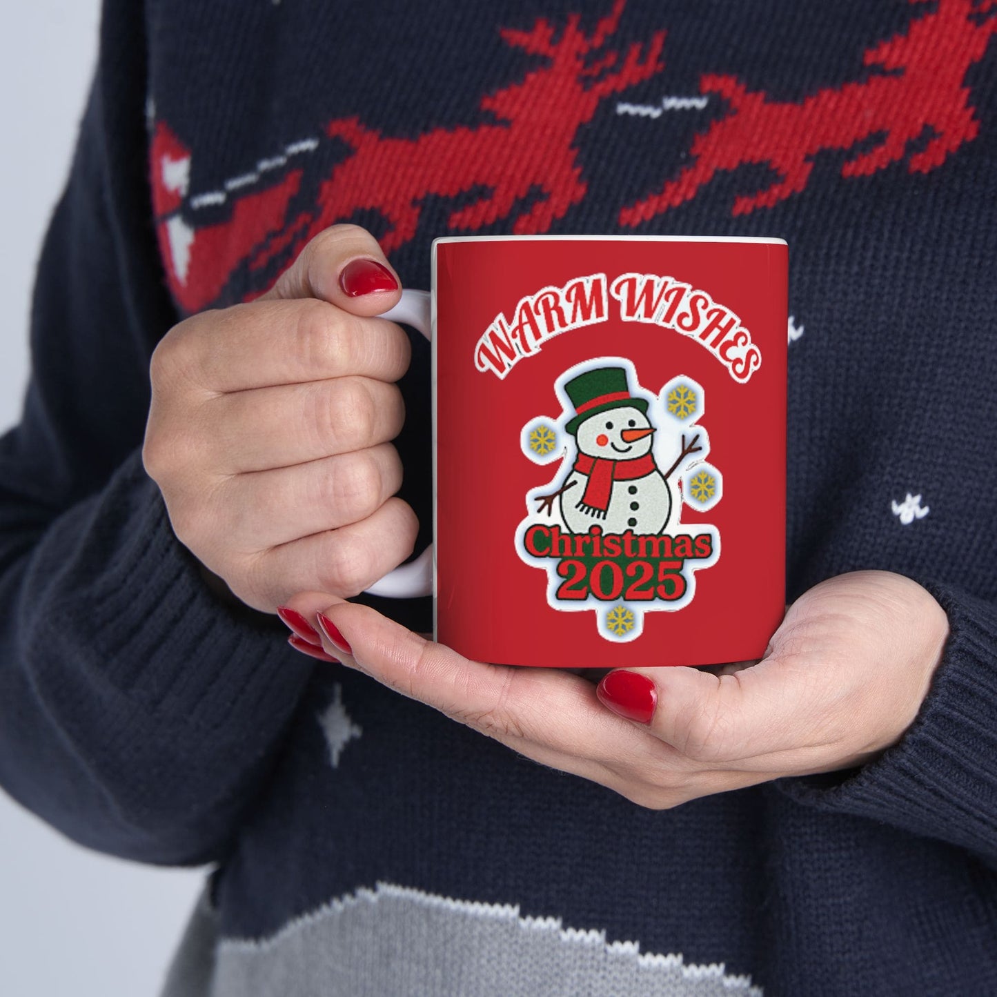 Christmas 2025 snowman mug held by woman in holiday sweater, festive gift idea.