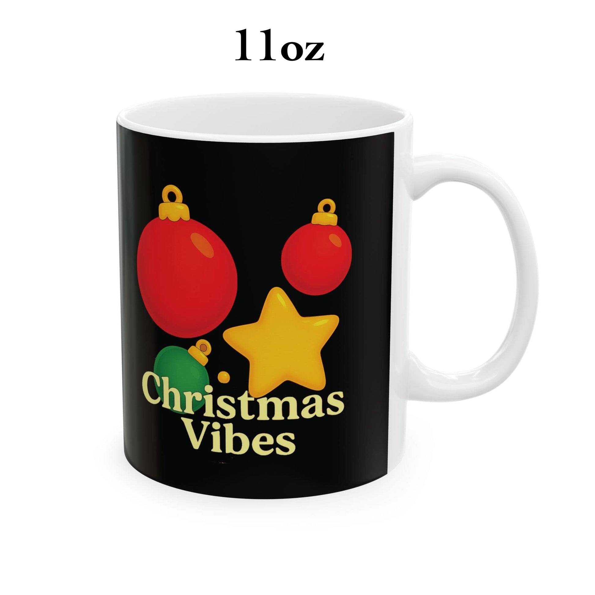 11oz white ceramic mug with black background, red and green ornaments, yellow star, and "Christmas Vibes" text.