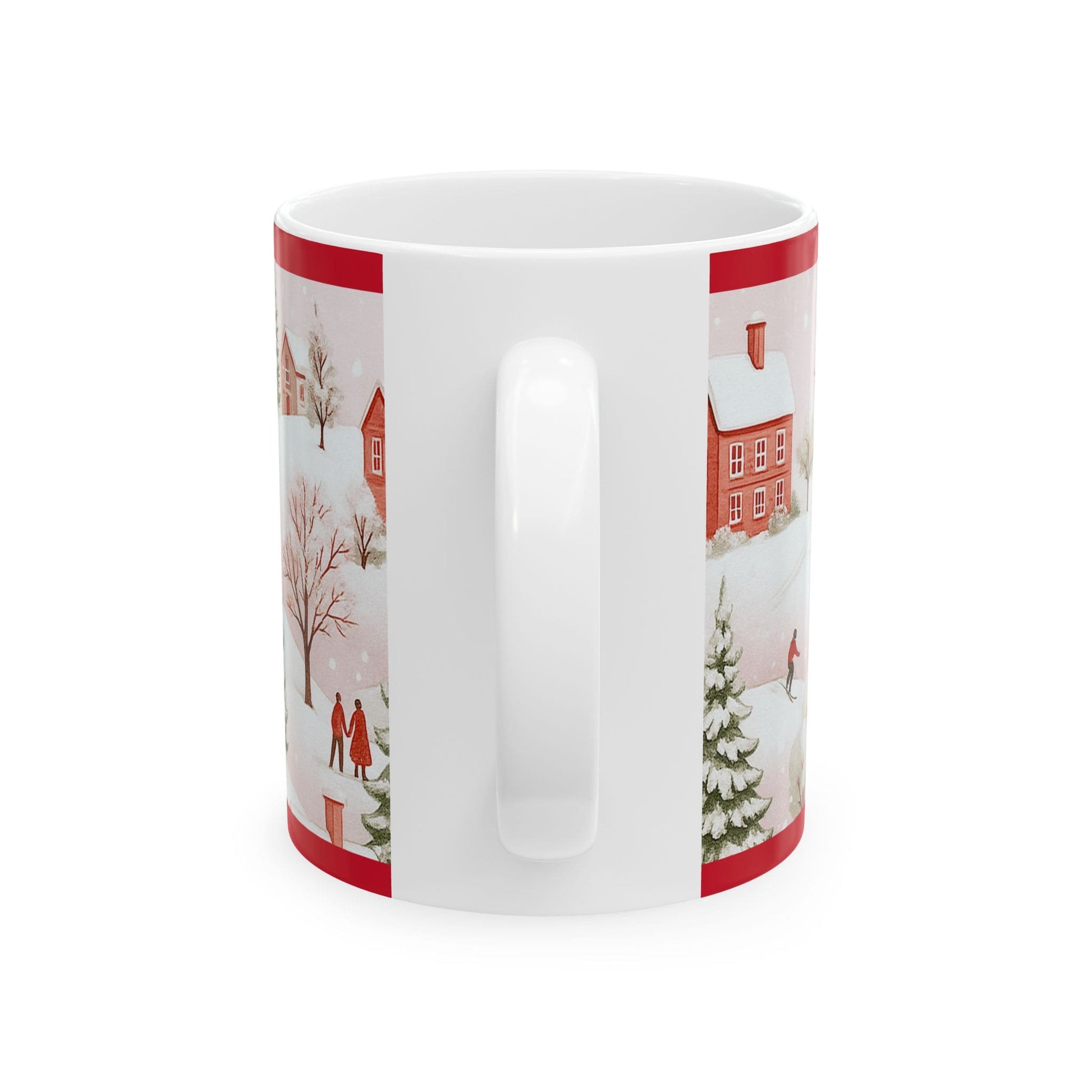 Back view of white ceramic 11oz mug showing handle, with partial winter Christmas village scene and red houses on both sides.