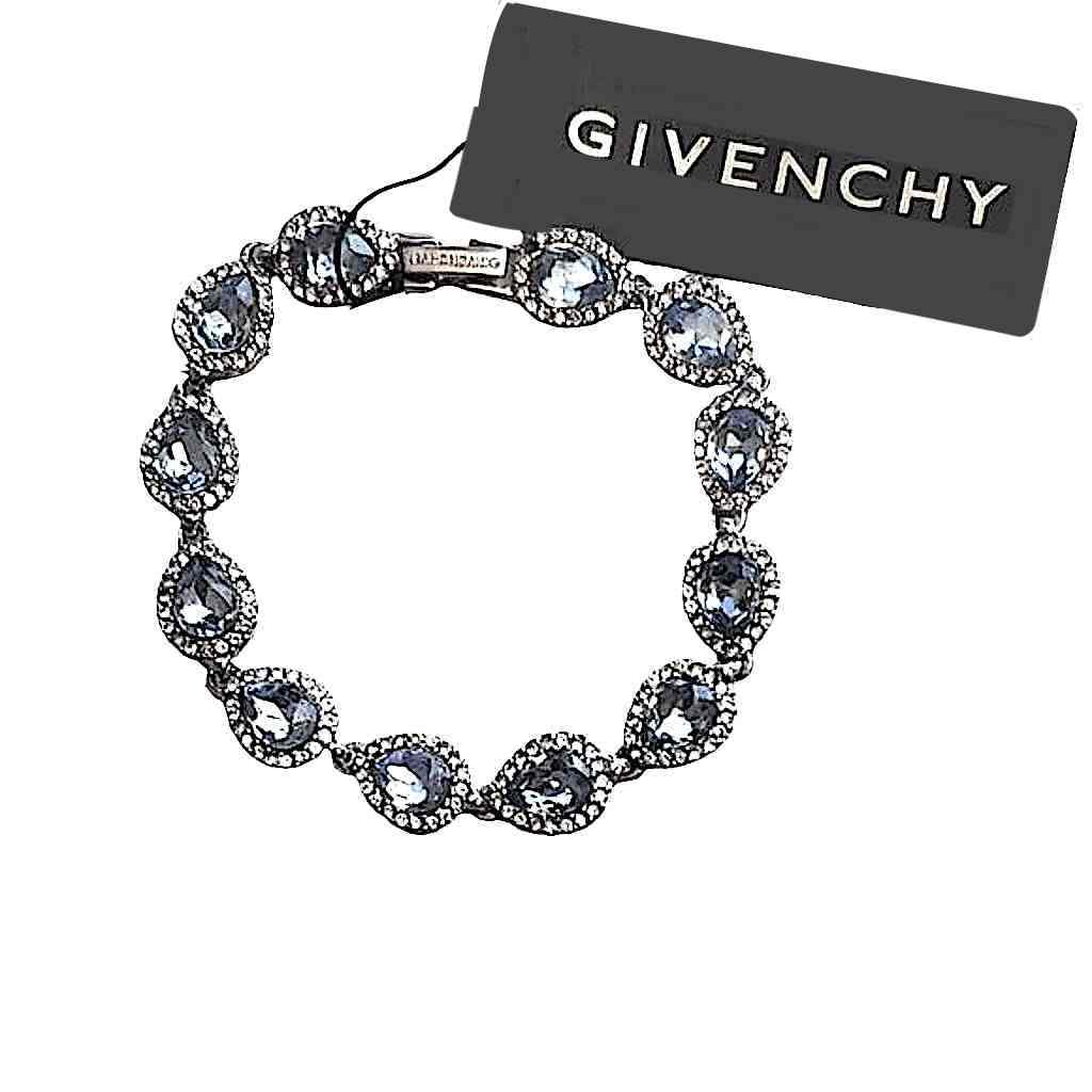 Elegant Givenchy bracelet with teardrop-shaped blue gemstones and sparkling crystal accents, perfect for a stylish statement.