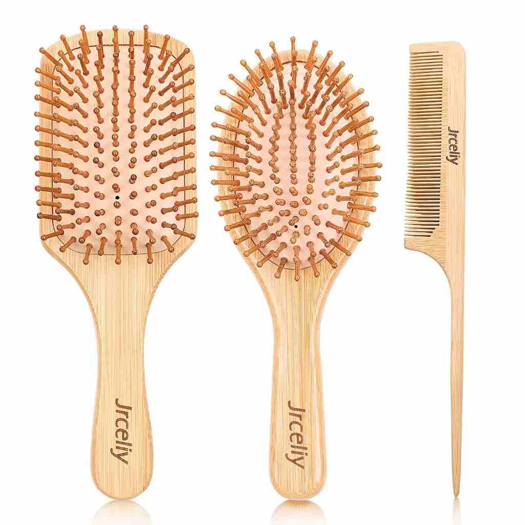 Jrceliy 3-piece bamboo hair brush set with a paddle brush, oval brush, and comb, made from eco-friendly natural bamboo.