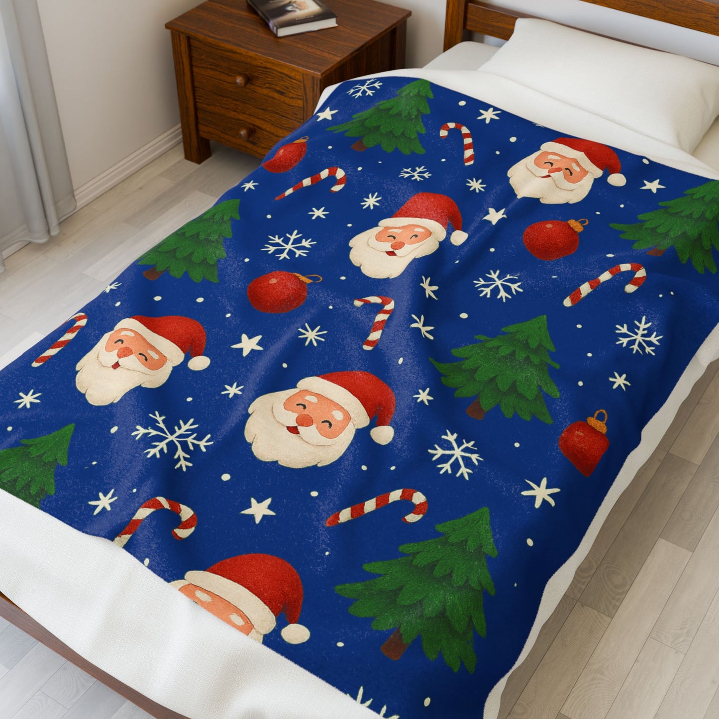 50x60 Christmas plush blanket with Santa faces, candy canes, trees, and snowflakes on a deep blue holiday design.