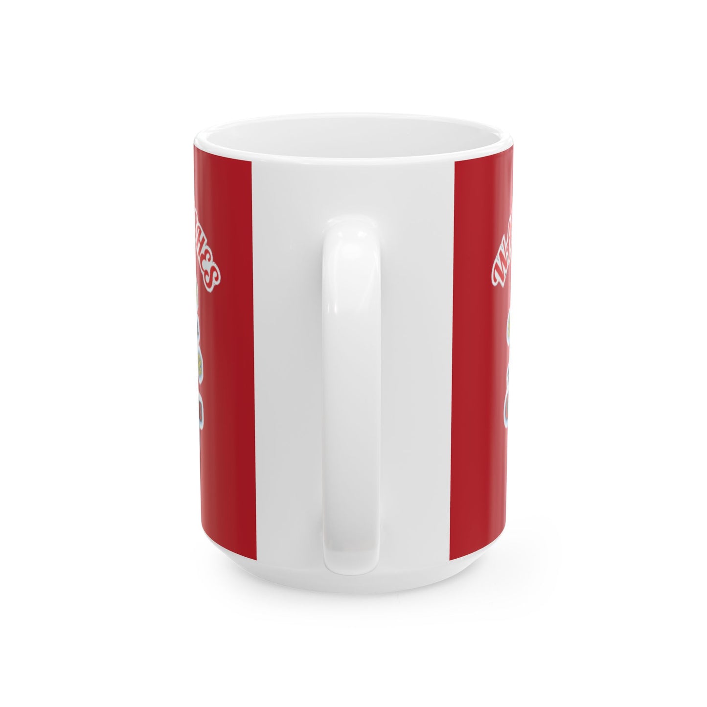 Back view of a white ceramic mug with a red cartoon-themed design, featuring a white handle and playful graphics partially visible.