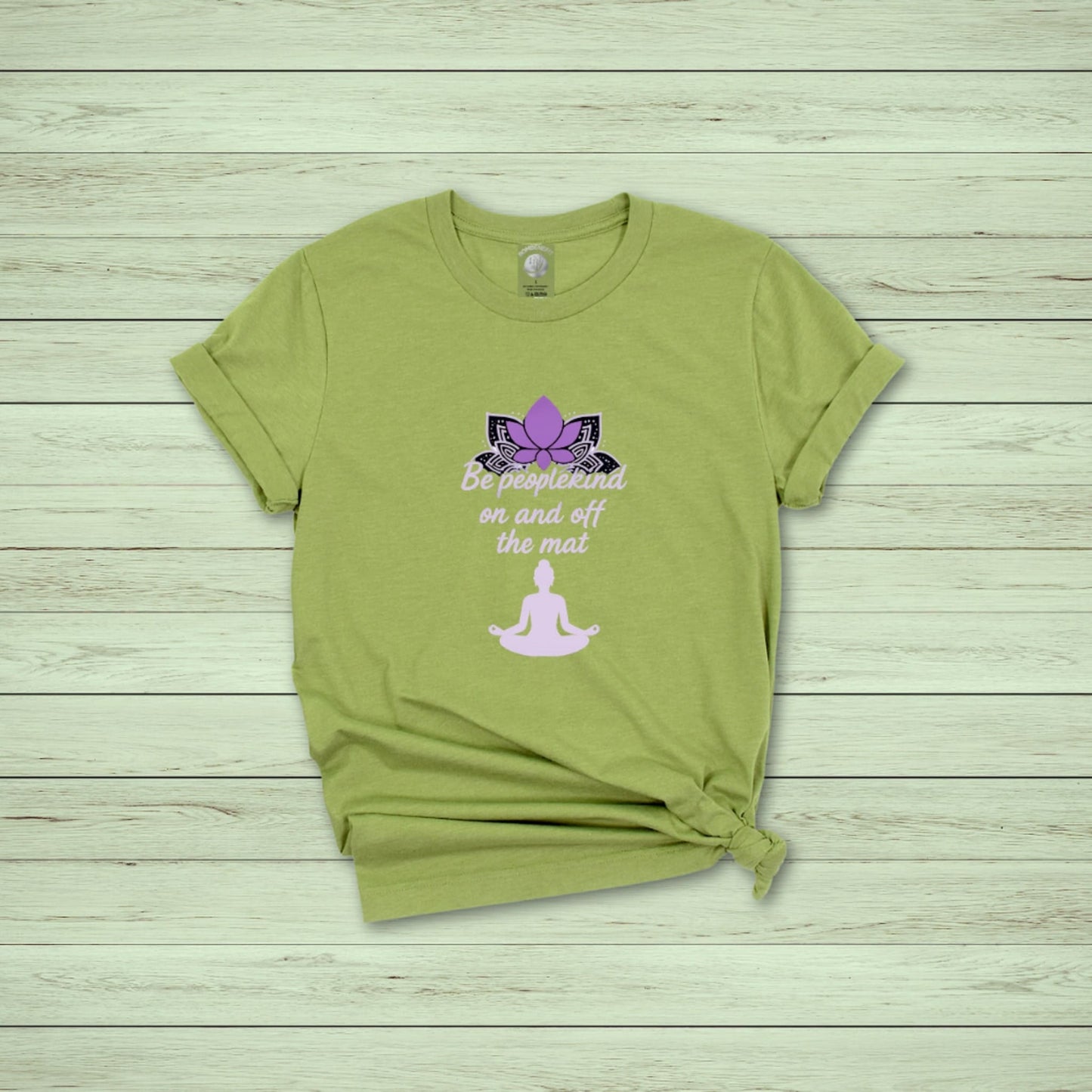 Heather green t-shirt with pink lotus and yoga quote "Be peoplekind on and off the mat" for meditation and wellness lovers








