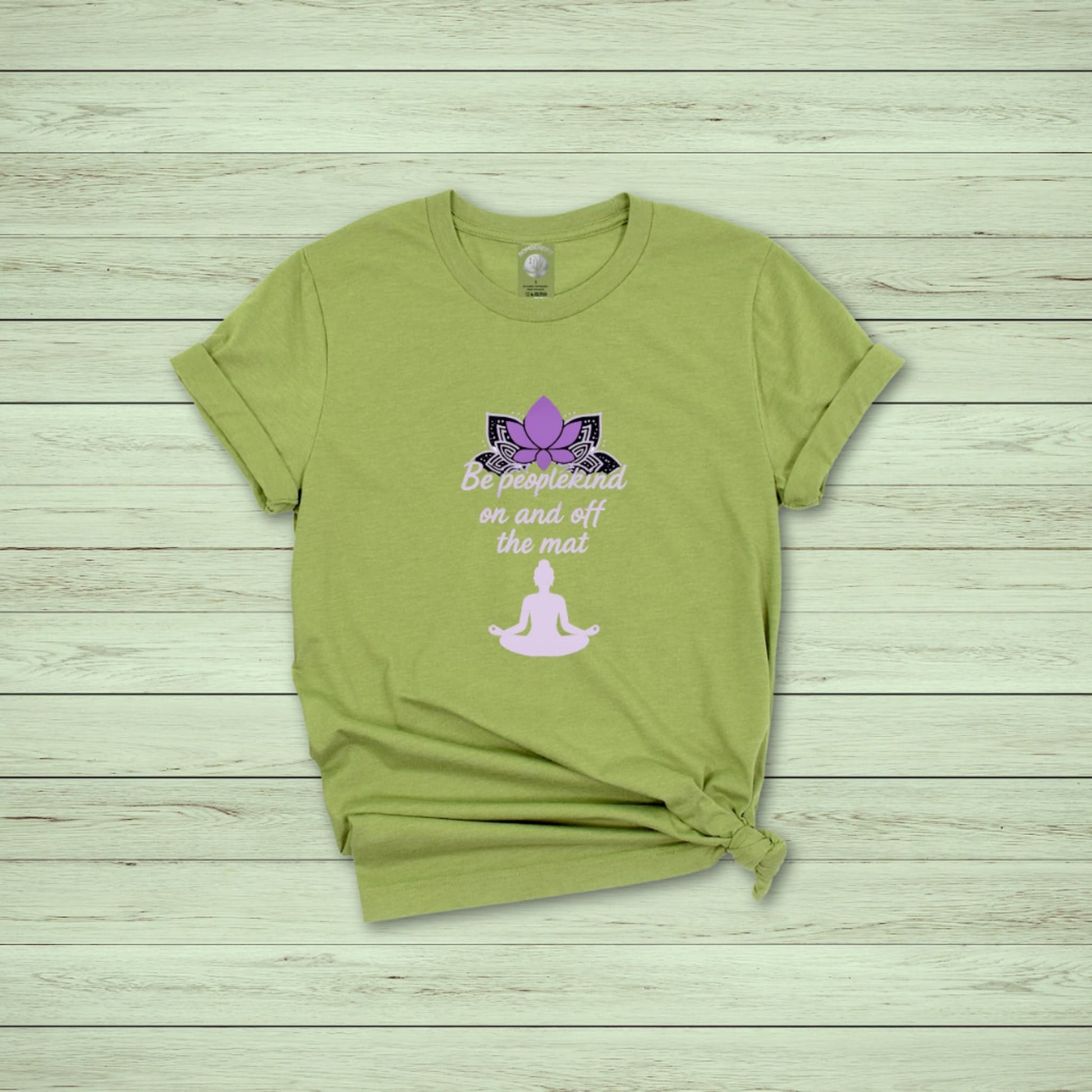 Heather green t-shirt with pink lotus and yoga quote "Be peoplekind on and off the mat" for meditation and wellness lovers








