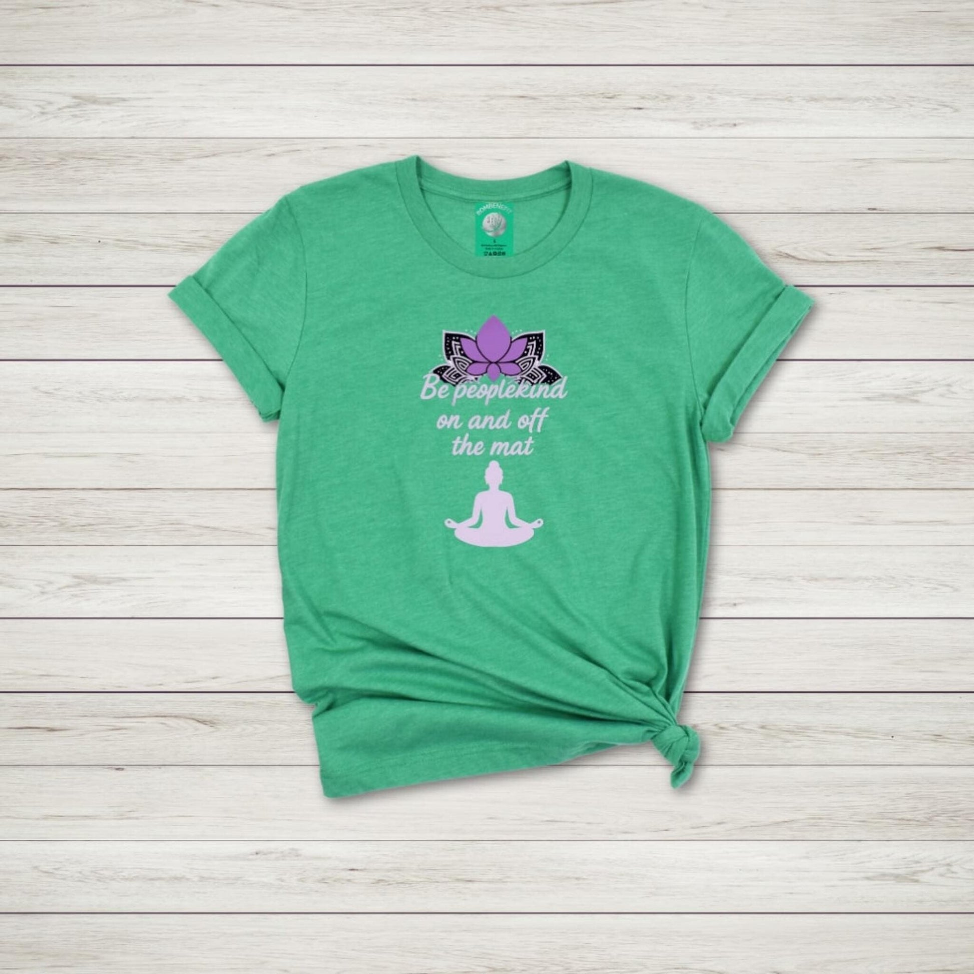 Heather Kelly Bella Canvas 3001 yoga t-shirt with lotus flower and quote Be peoplekind on and off the mat in purple ink