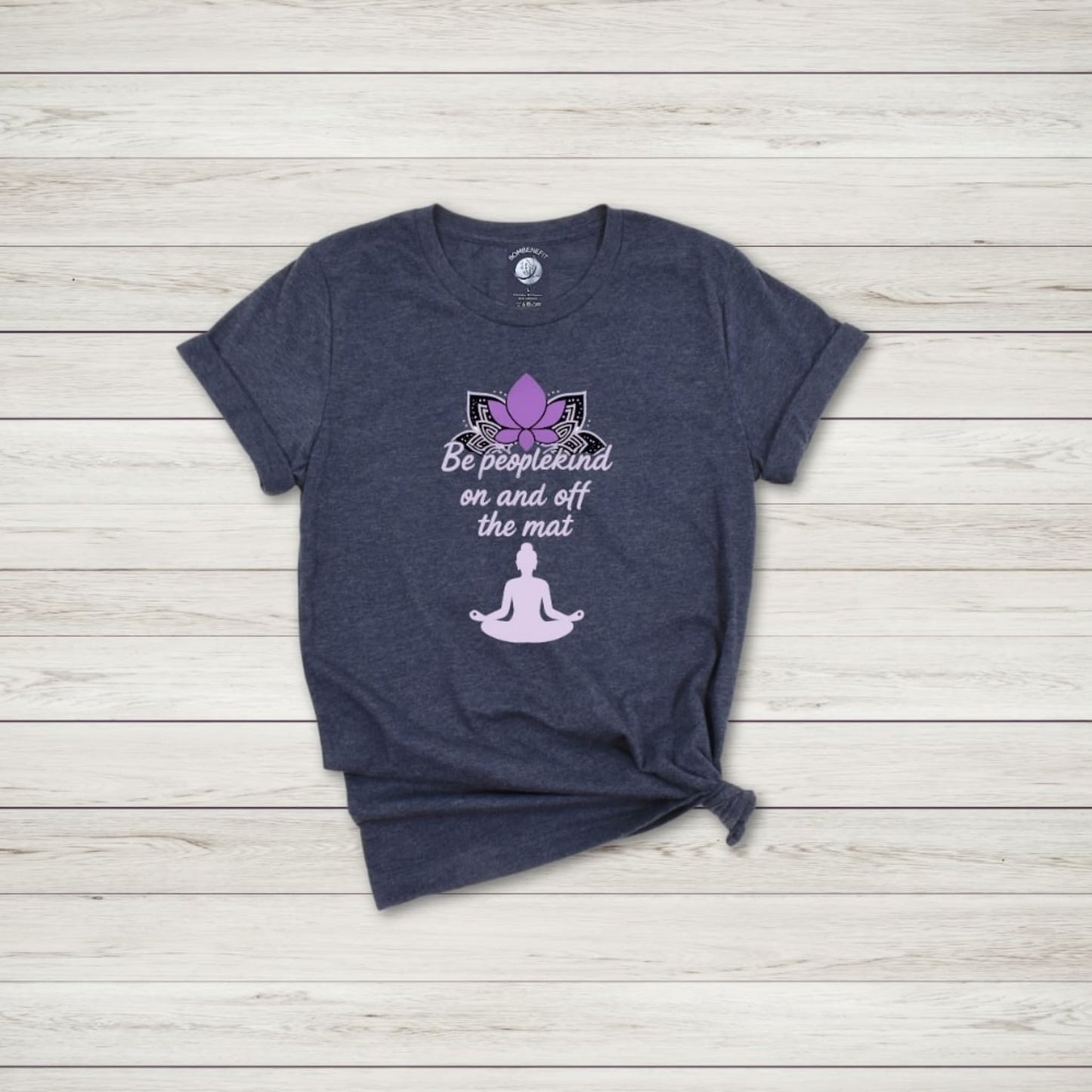 Heather navy t-shirt with pink lotus and yoga quote "Be peoplekind on and off the mat" for mindful lifestyle lovers