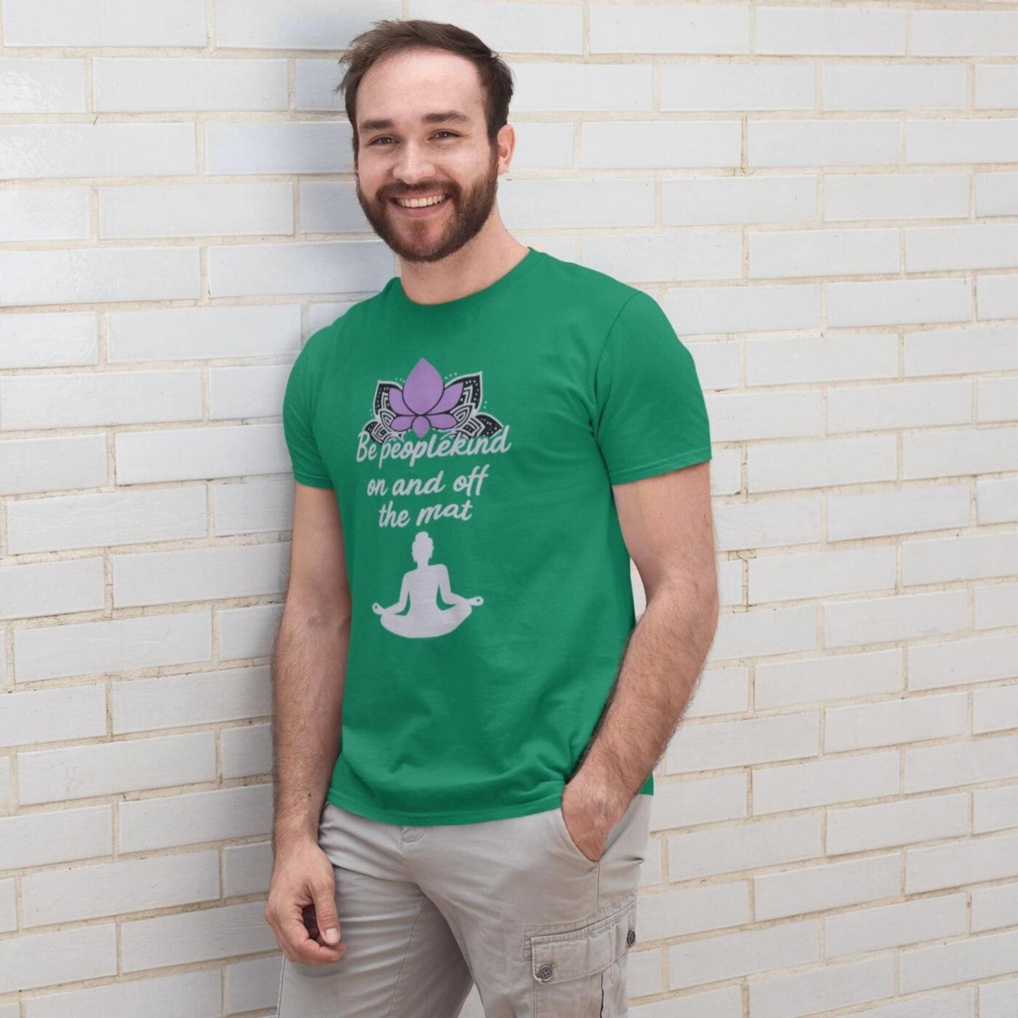 Kelly green Bella Canvas 3001 yoga t-shirt with Be peoplekind on and off the mat quote, modeled by smiling man outdoors