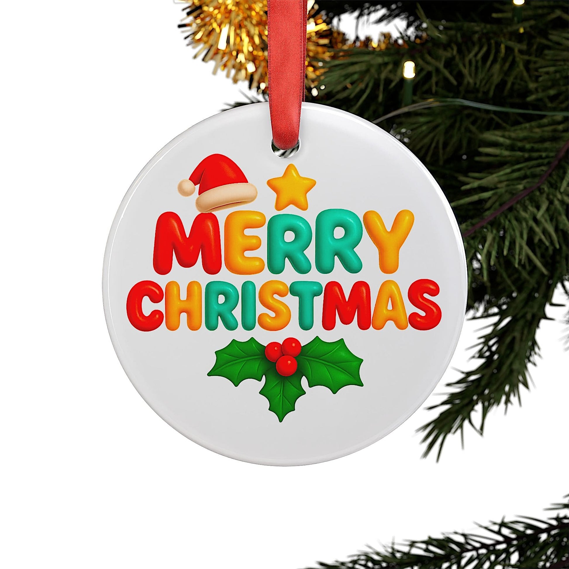 Round white Christmas ornament hanging on a tree with colorful Merry Christmas text and holly leaves.