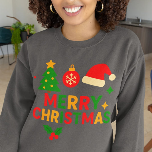Woman wearing a dark gray Merry Christmas sweatshirt with festive tree, ornament, Santa hat, holly, and colorful lettering, perfect holiday gift for women